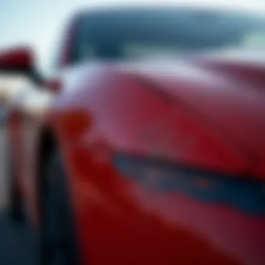 Close-up of a car paint scrape on a bumper